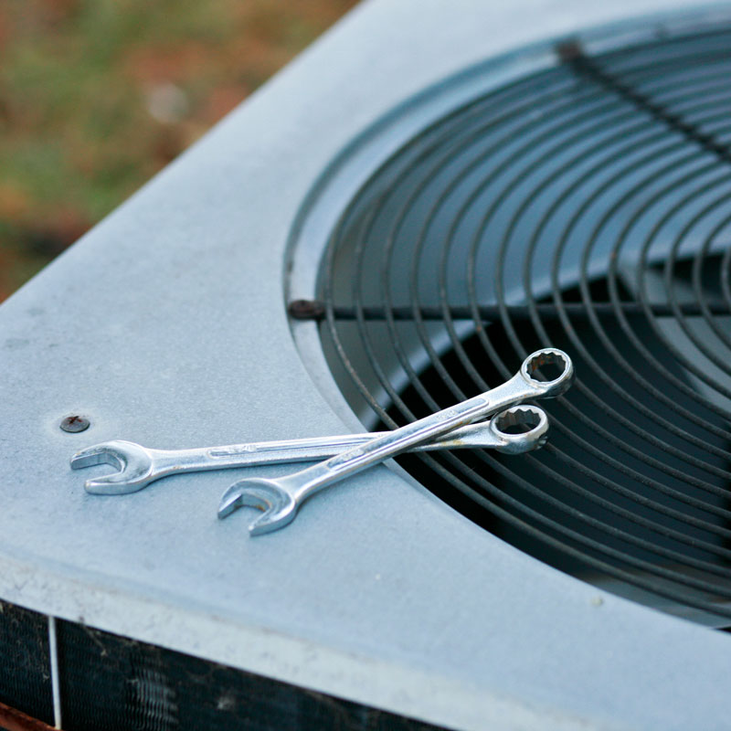 ac unit and wrenches